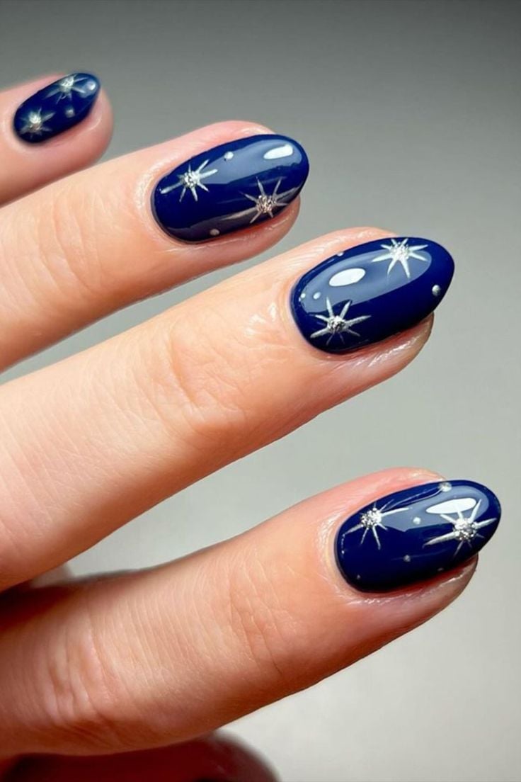 navy blue with stars nail art